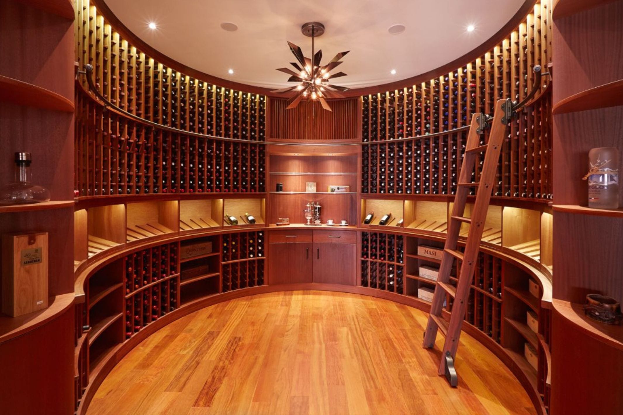 Curve Glass Wine Cellar by Genuwine Cellars
