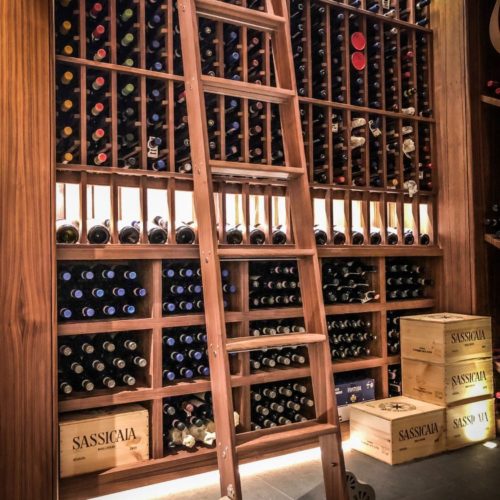 Walnut Wine Cellar with rolling ladder