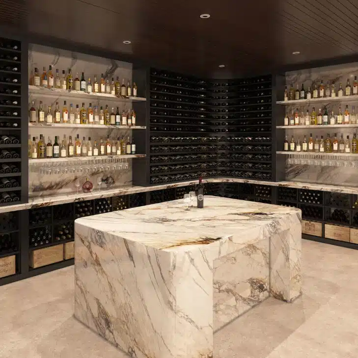 tasting room in basement with marble table and wooden racks designed by genuwine cellars